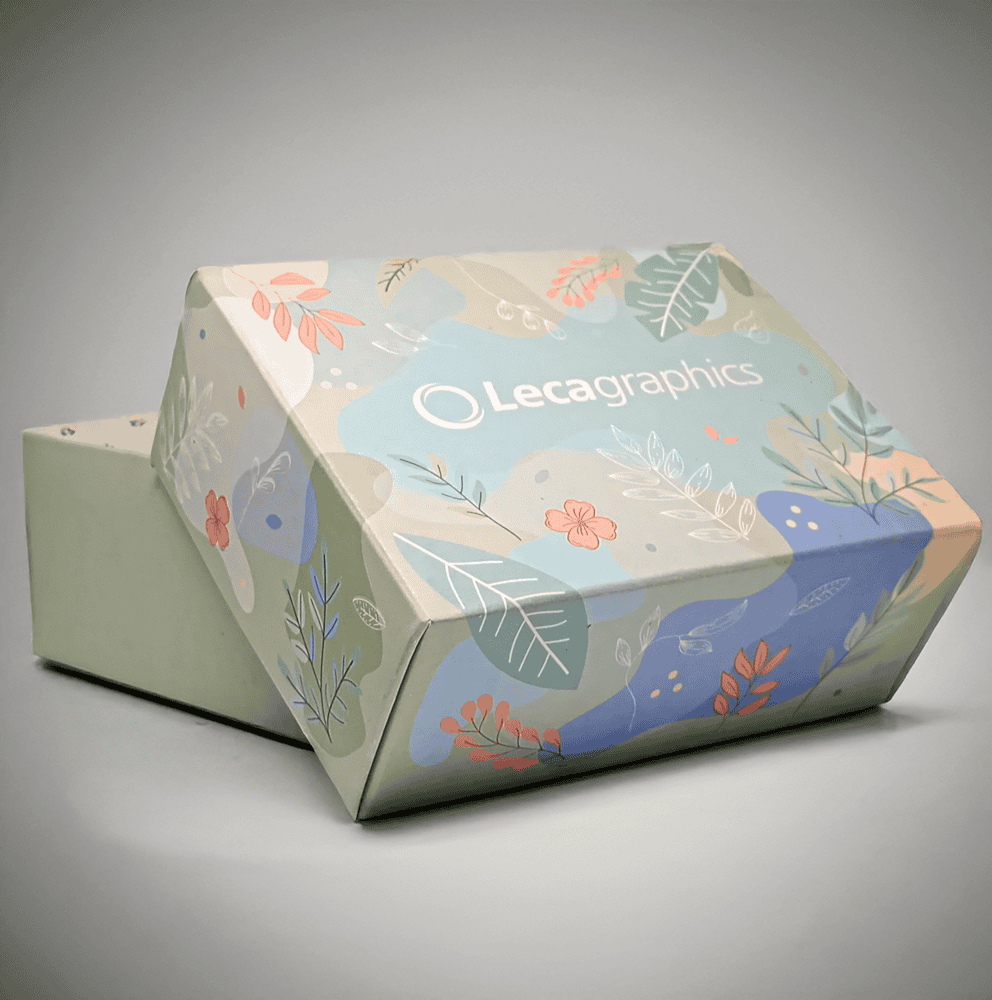 Self-assembling cardboard box with pastel floral design produced using high-quality conventional offset printing by Lecagraphics.