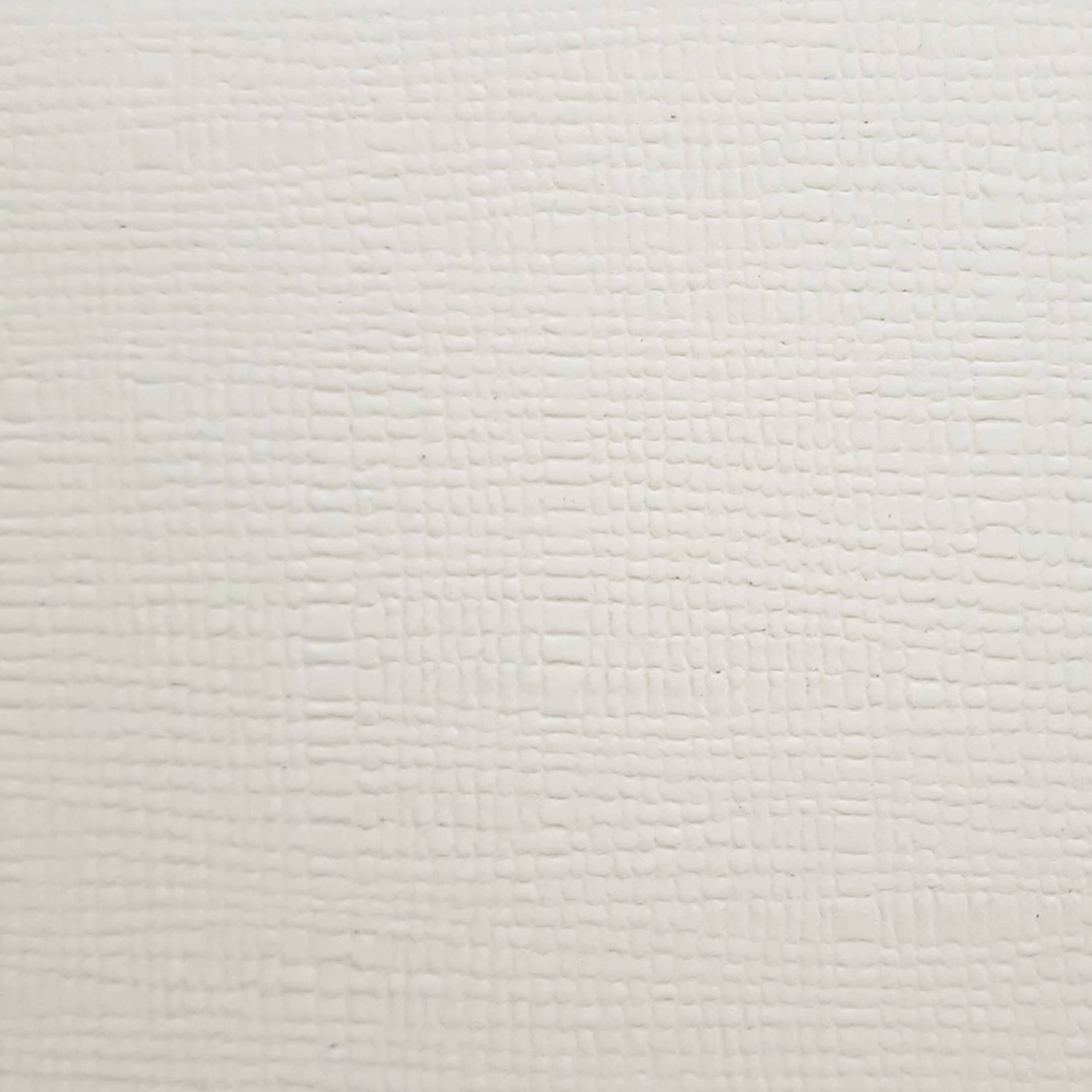 White paper sample featuring a debossing technique that creates linen-textured embossed packaging.