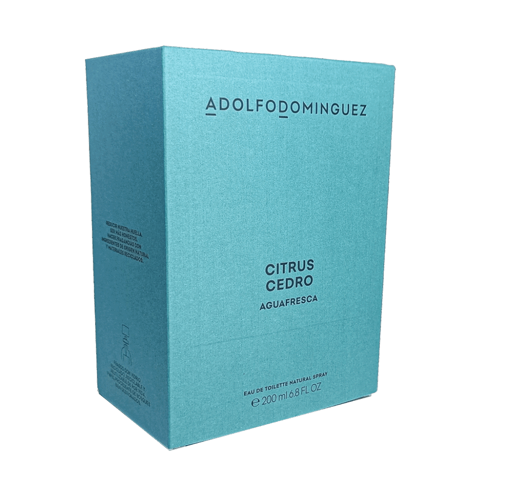 Packaging de lujo para fragancias en cartón rígido azul con impresión minimalista en letra moderna.